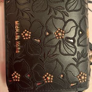 black and gold flower stud mk crossbody